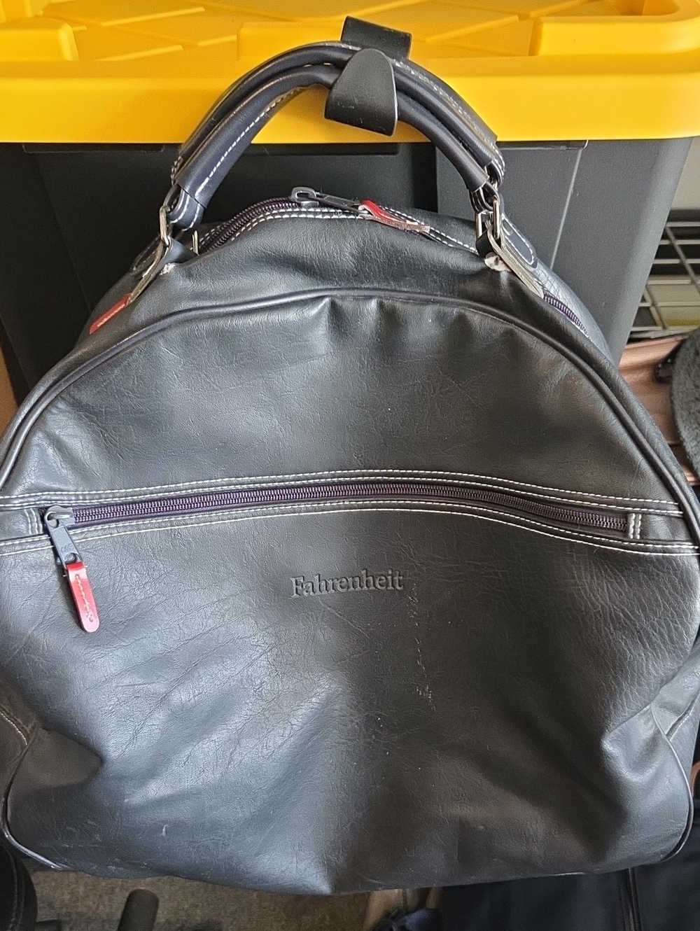 Fahrenheit Black Faux Leather Men's Travel Bag with Red Zipper Accents